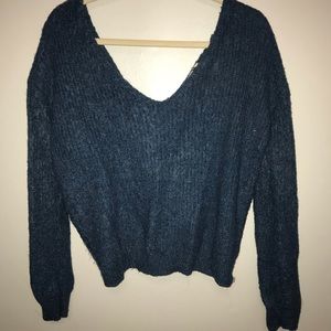 Blue fuzzy sweater with twist knot